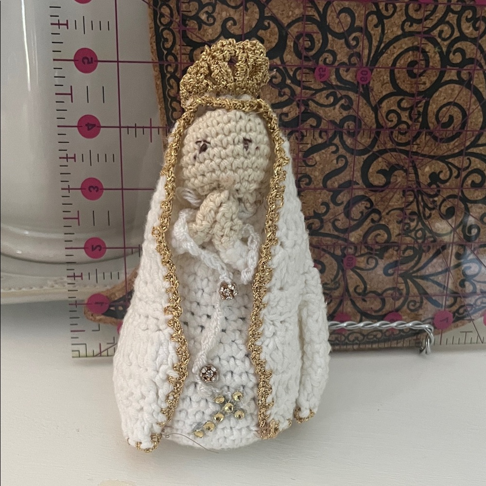 Handcrafted Crochet Figurine with Gold Accents